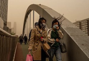 Women in masks in storm