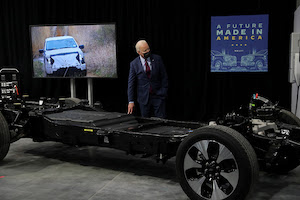 President Joe Biden by electric car