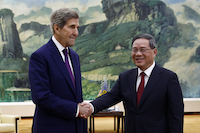 John Kerry shaking hands with Chinese Premier Li Qiang